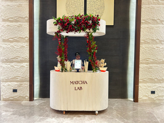 Floral Nokū Matcha Lab live matcha bar counter set up for an event in Delhi NCR